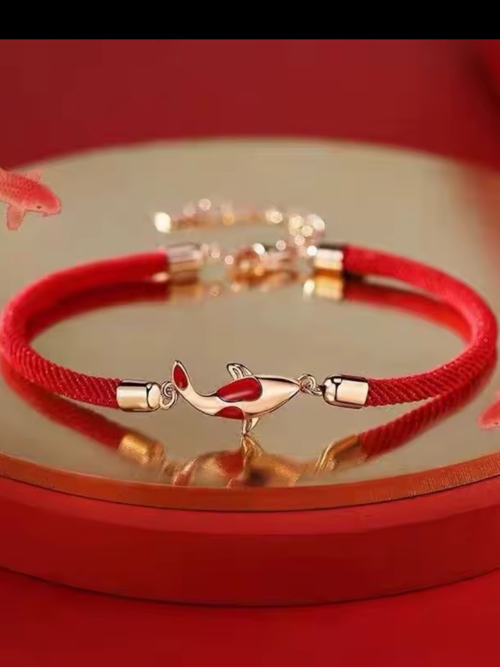 Anthropologie Red Cord Bracelet with Rose Gold Tone Dolphin Charm